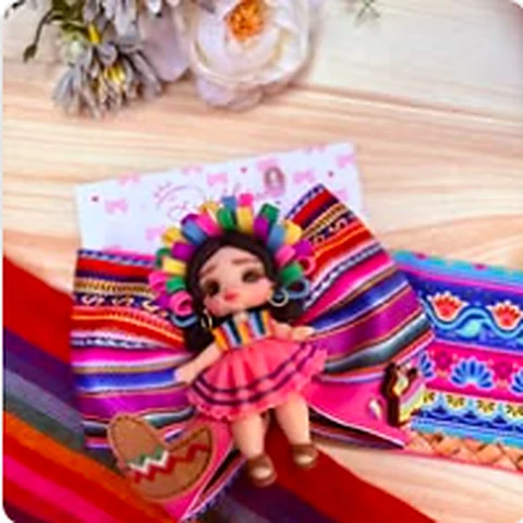 Moño de colores con diseño inspirado en la cultura mexicana